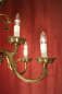 Preview: Spanischer Messing-Kronleuchter mit Maskaronen – 9-flammig – Louis-XV-Stil